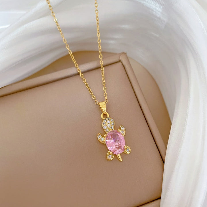 Rosa sköldpaddsörhängen – lyckobringande amulett, inklusive gratis halsband | Begränsat erbjudande