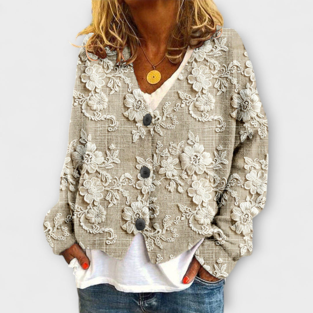 Stella - Blommönstrad cardigan med kiiltohihainen