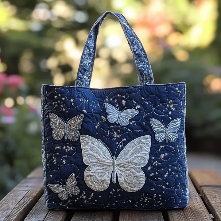 Quiltad väska – Silverfärgad fjäril