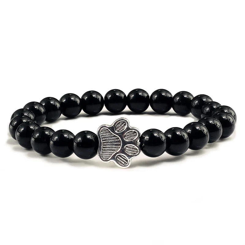 Tassunjäljen armband, dekorerat med pärlor och delikat