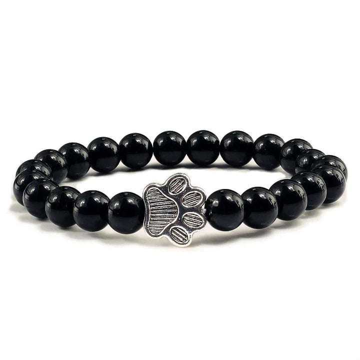 Tassunjäljen armband, dekorerat med pärlor och delikat