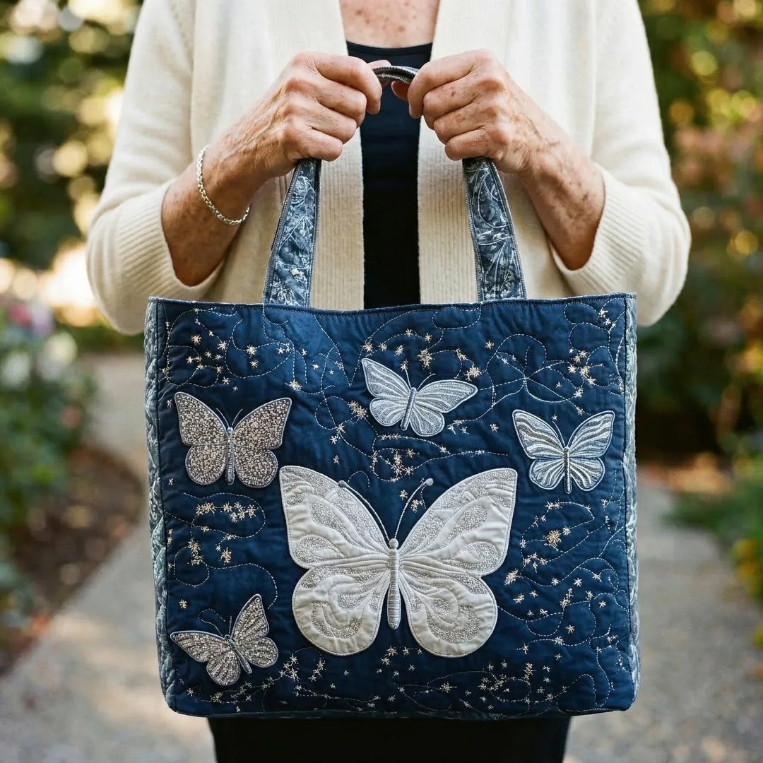 Quiltad väska – Silverfärgad fjäril
