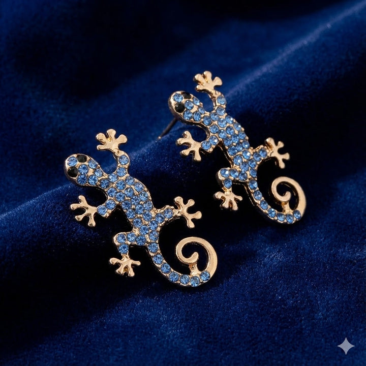 Geckoörhängen med lyckotalisman – gratis ring | Begränsat erbjudande
